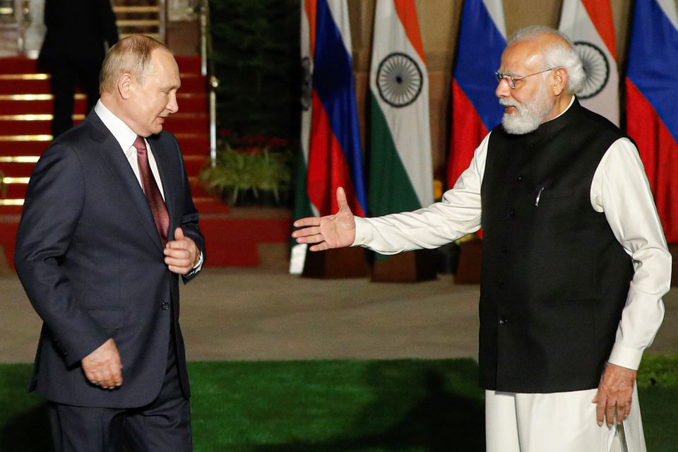 india s prime minister narendra modi welcomes russia s president vladimir putin ahead of their meeting at hyderabad house in new delhi india december 6 2021 photo reuters