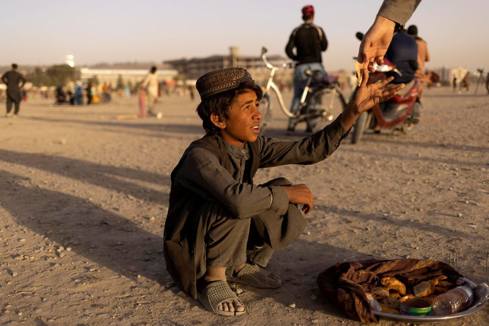 a boy sells food in a park in kabul afghanistan october 22 2021 reuters