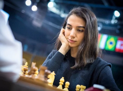 iranian woman competes at chess tournament without hijab  media reports