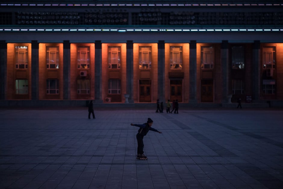 In a photo taken on February 18, 2017 a boy rollerskates on Kim Il-Sung sqaure in Pyongyang. PHOTO: AFP