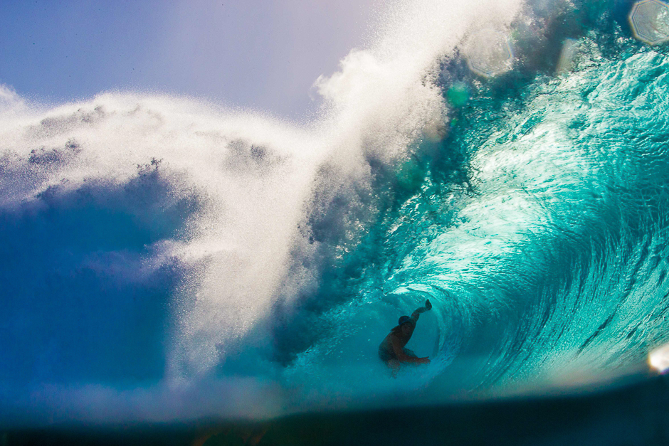 Surfer Tamayo Perry rides the barrel during a late afternoon free surf session at the legendary Banzai Pipeline on the North shore of Oahu, Hawaii. PHOTO: AFP