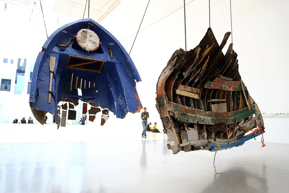 Remnants of boats used by refugees and recovered at Greek coasts are displayed as part of a project by Mexican artist Guillermo Galindo ahead of the opening of Germany's biggest art fair 