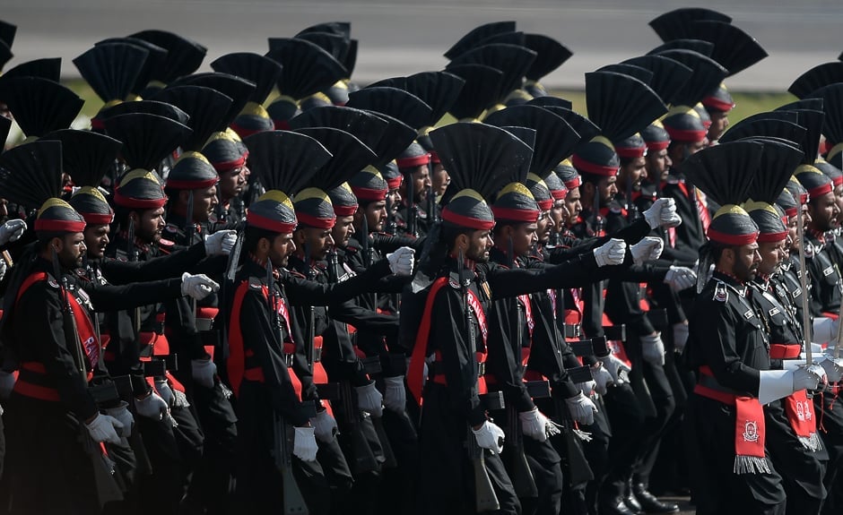 Border soldiers march past during a Pakistan Day military parade in Islamabad. PHOTO: AFP