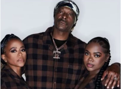 snoop dogg celebrates daughter cori broadus 25th birthday with family photos in matching flannels