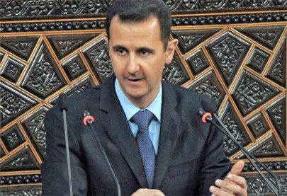 assad says syria war will be long difficult