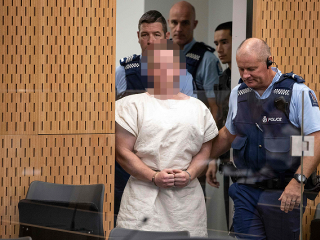 brenton tarrant the man charged in relation to the christchurch massacre is lead into the dock for his appearance in the christchurch district court photo afp