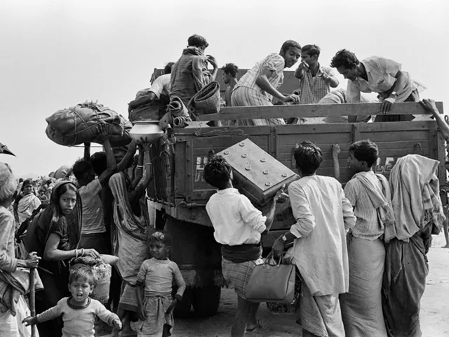 in this photo taken on february 1 1972 bengali refugees try to board a truck to return to their country after the indo pakistani war of 1971 in kolkata photo afp in this photo taken on february 1 1972 bengali refugees try to board a truck to return to their country after the indo pakistani war of 1971 in kolkata photo afp