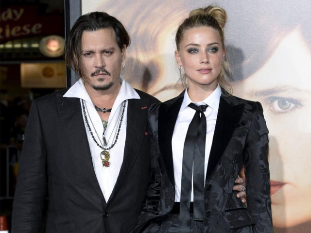 cast member amber heard and husband johnny depp pose during the premiere of the film quot the danish girl quot in los angeles california november 21 2015 photo reuters cast member amber heard and husband johnny depp pose during the premiere of the film quot the danish girl quot in los angeles california november 21 2015 photo reuters