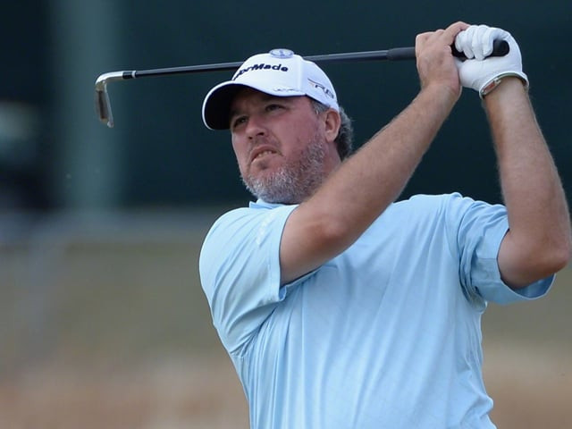 weekley holds off scot with two stroke lead weekley holds off scot with two stroke lead