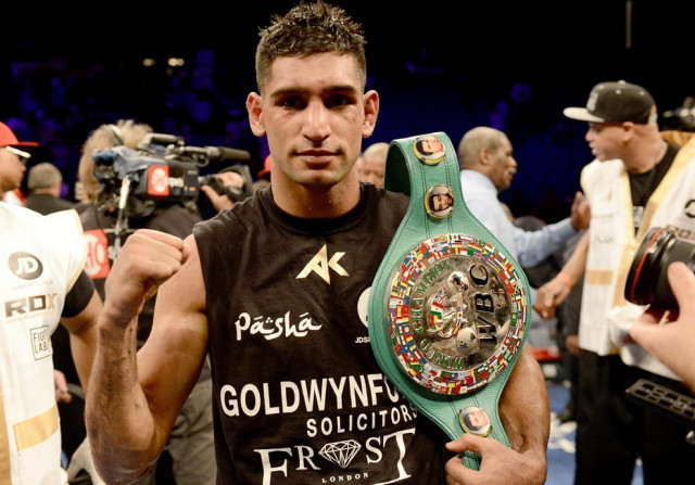 boxer amir khan to visit pakistan in support of peshawar school victims boxer amir khan to visit pakistan in support of peshawar school victims