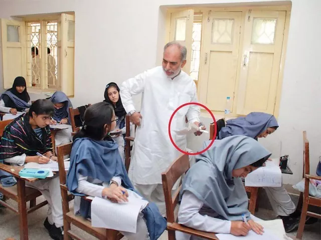 board of education sukkur examination controller mehmoodul hasan khokar confiscates cheating material from students photo naeem ahmed ghouri express board of education sukkur examination controller mehmoodul hasan khokar confiscates cheating material from students photo naeem ahmed ghouri express