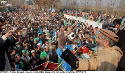 pointing fingers ji blames musharraf for fostering militancy