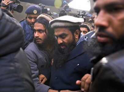 court remands mumbai attacks mastermind for two days over abduction charges