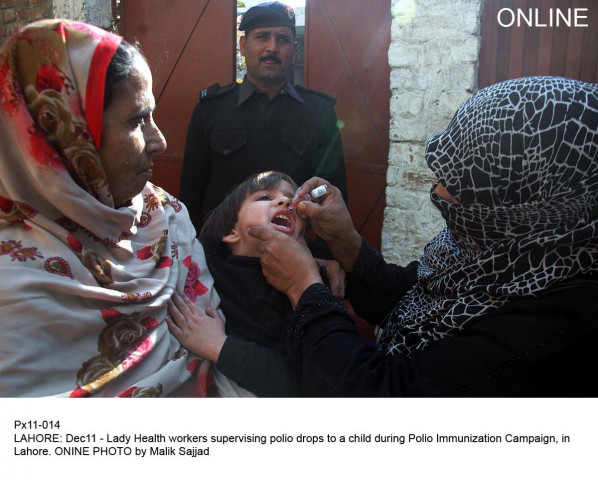 a file photo of polio worker administering drops to a child photo online a file photo of polio worker administering drops to a child photo online