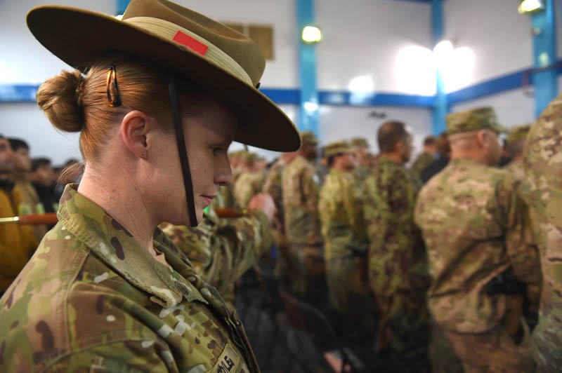 nato led isaf soldiers attend a ceremony marking the end of isaf 039 s combat mission in afghanistan at isaf headquarters in kabul on december 28 2014 photo afp