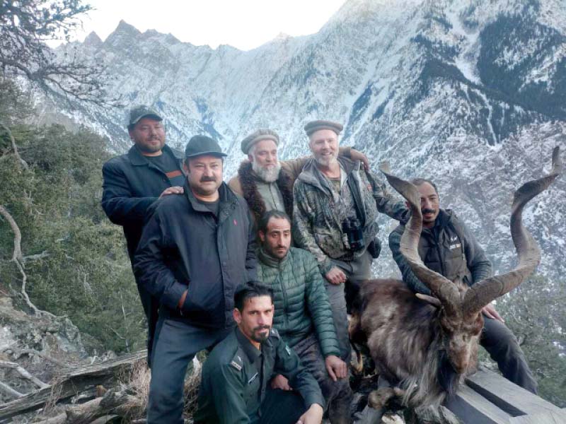 us hunter richard danley wildlife officials and local hosts with the markhor he shot under trophy hunting programme on payment of rs10 3m fee photo express
