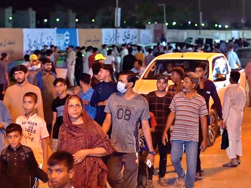 people come to buy sacrificial animals at the cattle market on super highway in karachi photo express