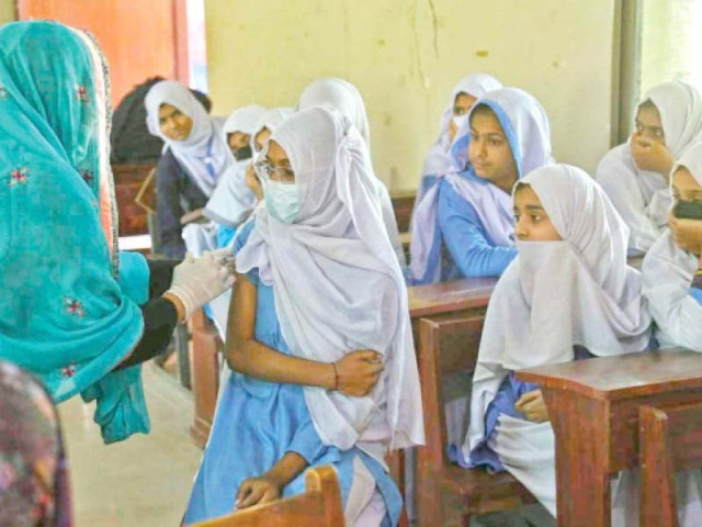 students of ibrahim ali bhai government school fb area get anti covid jabs photo jalal qureshi express file students of ibrahim ali bhai government school fb area get anti covid jabs photo jalal qureshi express file