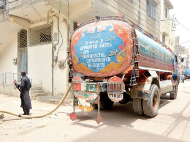 a man supplies water from a tanker in a neighbourhood in karachi where advent of summers means water shortage and added expenses of purchasing it from tankers photo jalal qureshi express a man supplies water from a tanker in a neighbourhood in karachi where advent of summers means water shortage and added expenses of purchasing it from tankers photo jalal qureshi express