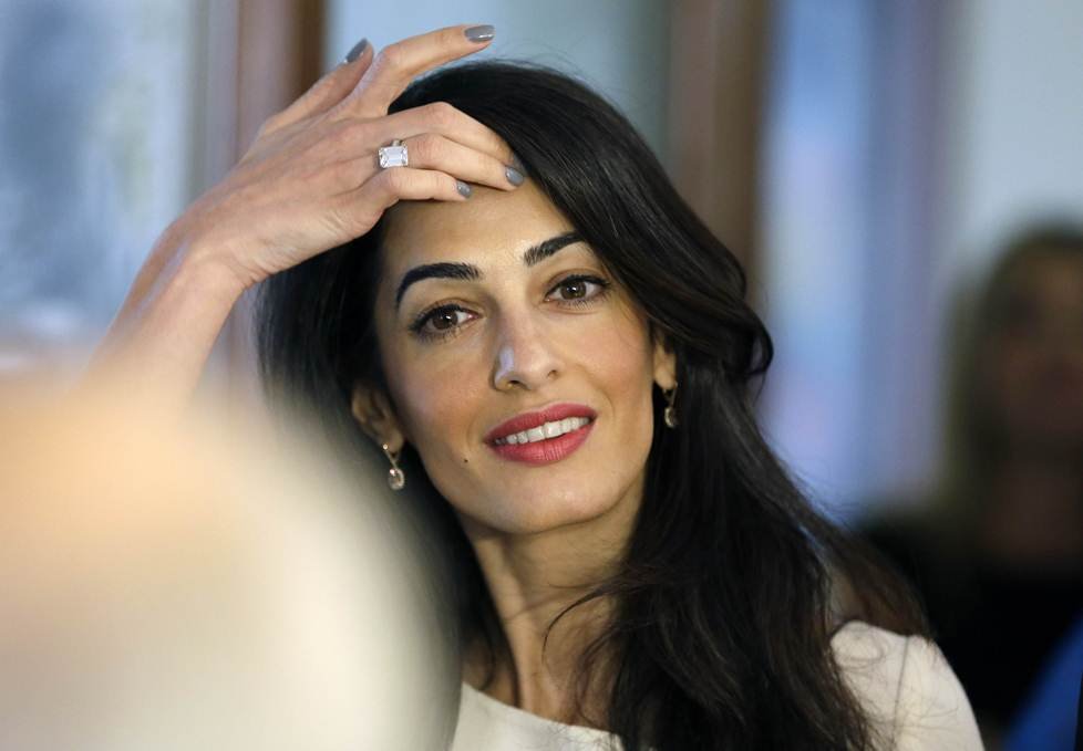 in this file photo human rights lawyer amal alamuddin clooney attends a meeting at the greek ministry of culture and sports in athens on october 14 2014 photo afp