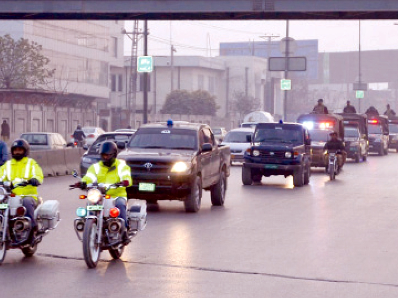 rawalpindi police hold a flag march in the city photo inp