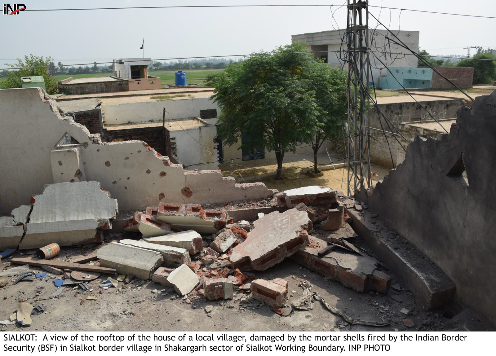 roof of a house in shakargarh sector near the sialkot working boundary which was damaged by indian shelling photo inp