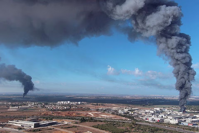 Smoke is seen in the Rehovot area as rockets are launched from the Gaza Strip, in Israel October 7 REUTERS