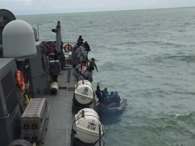 an indonesian navy seaboat picks up items retrieved photo reuters an indonesian navy seaboat picks up items retrieved photo reuters