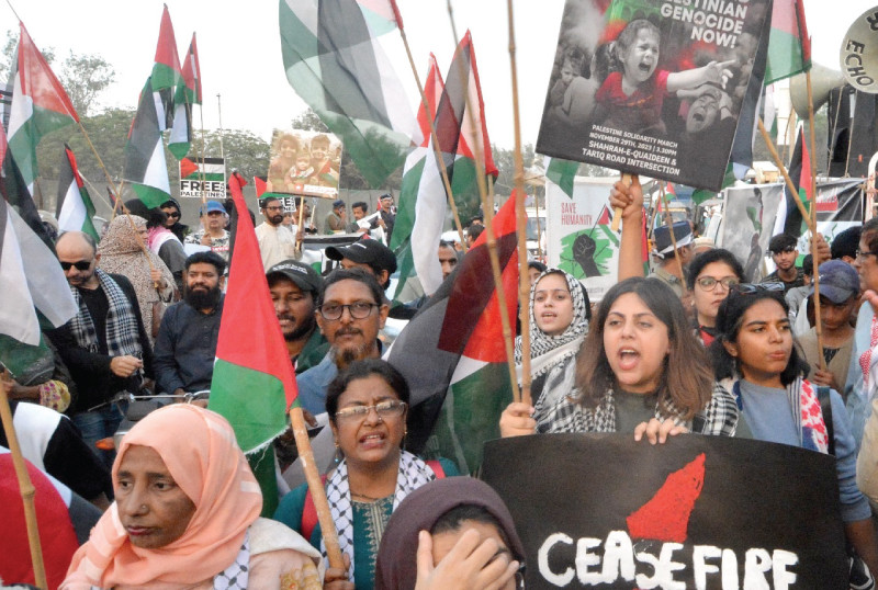 women take part in a rally organized by the civil society and palestine solidarity committee to denounce israeli atrocities in gaza and raise voice for the people of palestine photo express