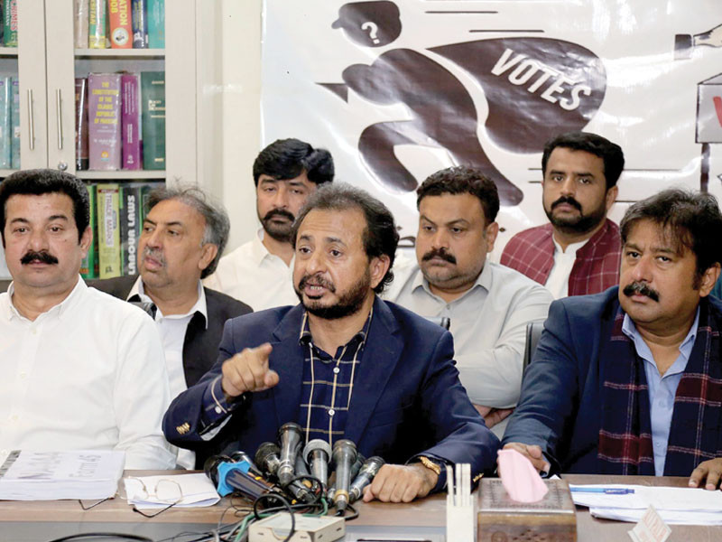 pti sindh president haleem adil sheikh addresses a press conference in karachi on sunday to highlight the alleged rigging in polls photo nni
