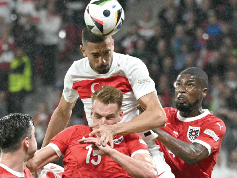 merih demiral centre was turkey s hero with two goals against austria photo afp