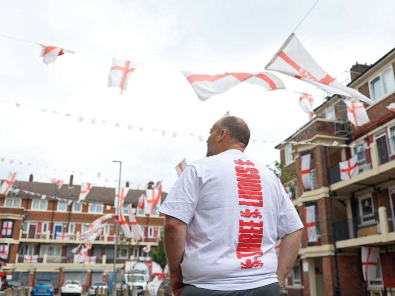 resident chris dowse poses as he views areas of the kirby estate on friday decorated mostly with england and spain flags ahead of the uefa euro 2024 final photo reuters