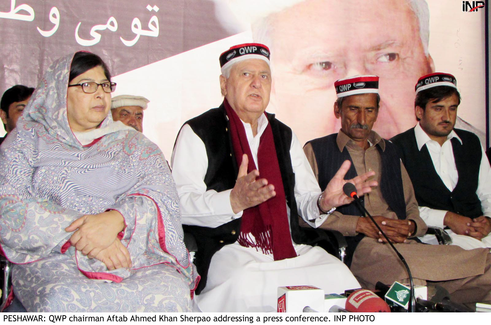 qwp chief aftab ahmed sherpao c addressing a press conference in peshawar photo inp
