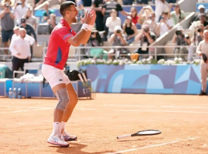 novak djokovic flaunts olympic gold medal at star studded paris celebration