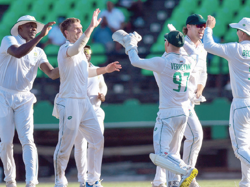 wiaan mulder 2nd l and kagiso rabada l of south africa celebrate the dismissal of joshua da silva l of west indies in second test photo afp