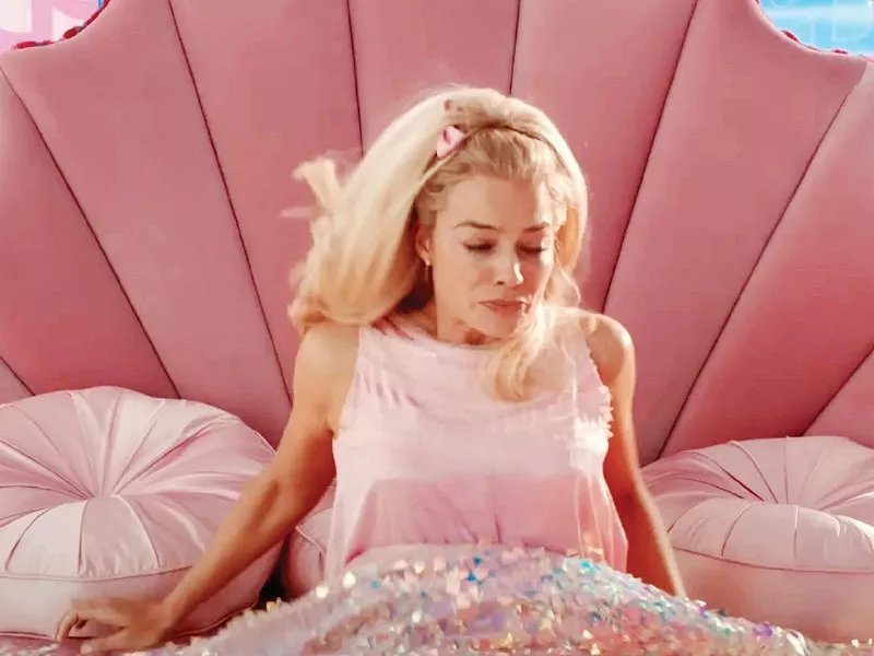 never hit the snooze button instead set multiple alarms a few minutes apart it helps if you imagine rising out of bed like margot robbie in barbieland photo file never hit the snooze button instead set multiple alarms a few minutes apart it helps if you imagine rising out of bed like margot robbie in barbieland photo file
