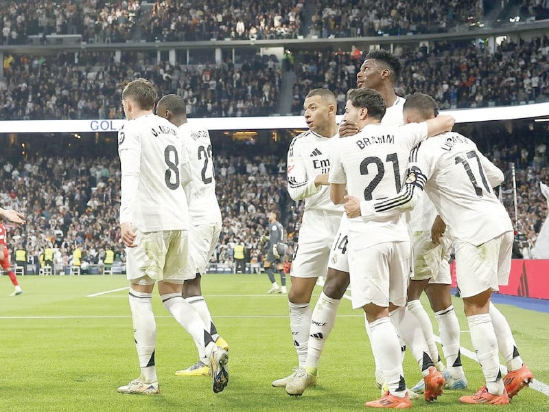 real madrid s french forward kylian mbappe celebrates scoring the opening goal against sevilla photo afp