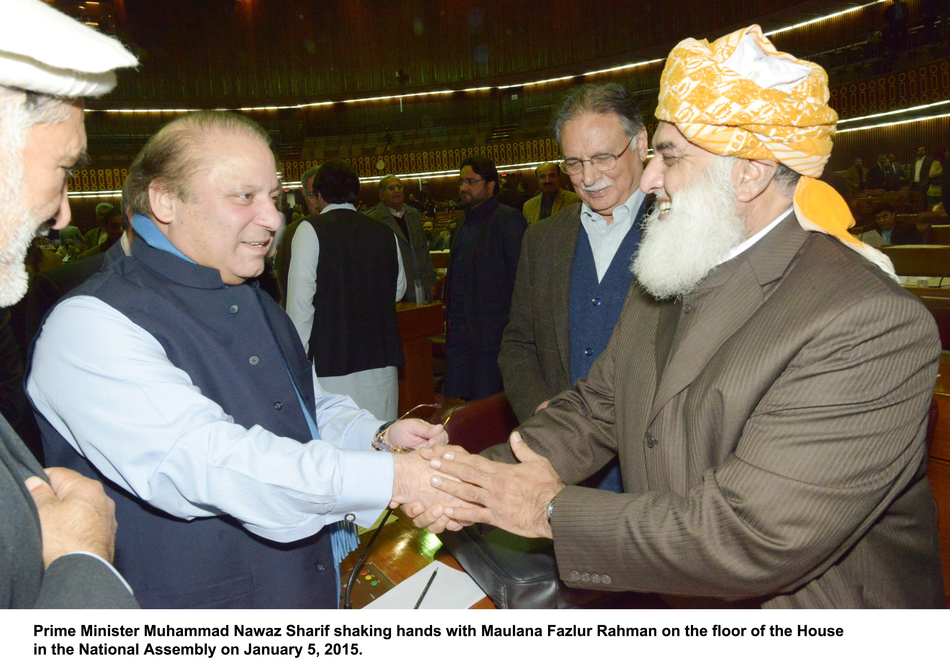 prime minister nawaz sharif shakes hands with jui f chief maulana fazlur rehman in the national assembly on monday photo pid
