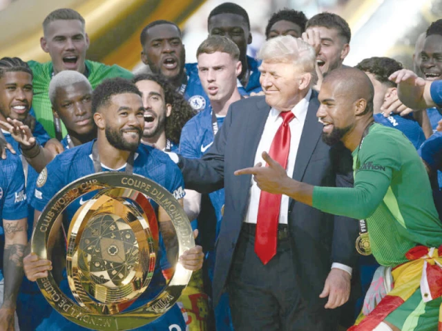 chelsea captain reece james holds the club world cup trophy alongside us president donald trump brendan photo afp chelsea captain reece james holds the club world cup trophy alongside us president donald trump brendan photo afp