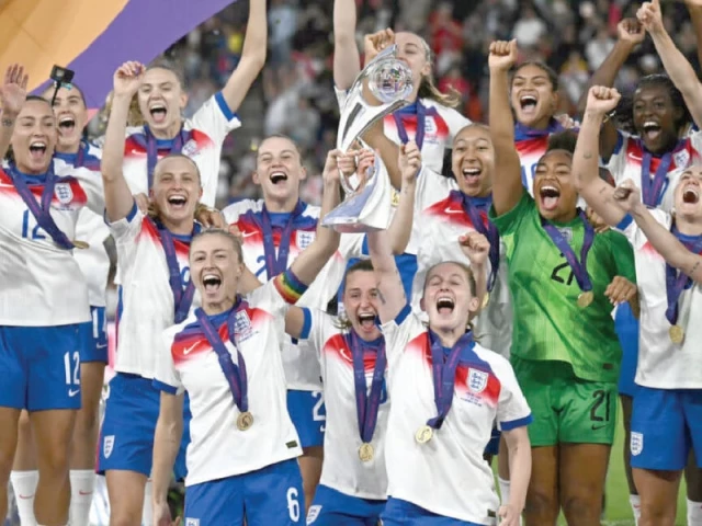 england players lift the trophy after beating spain on penalties to win the women s euro 2025 photo afp