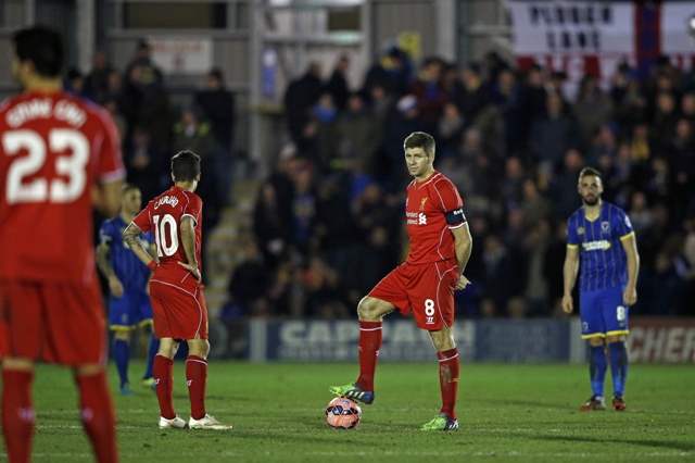 gerrard a two time fa cup winner scored twice to give liverpool a 2 1 win over their valiant fourth tier opponents bolton wanderers photo afp