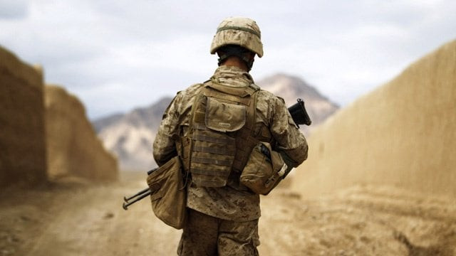 a us marine from the first battalion eighth marines alpha company patrols through the town of nabuk in southern afghanistan 039 s helmand province february 18 2011 photo reuters a us marine from the first battalion eighth marines alpha company patrols through the town of nabuk in southern afghanistan 039 s helmand province february 18 2011 photo reuters