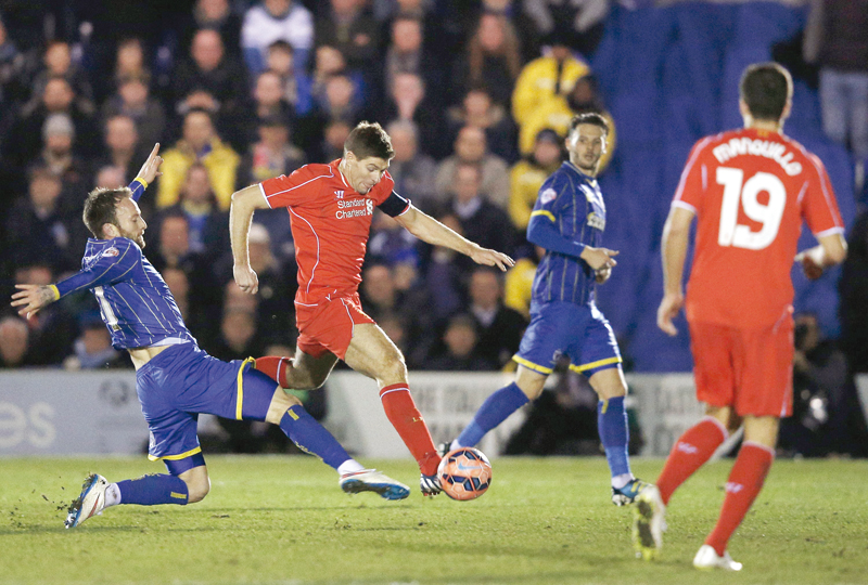 steven gerrard s long goodbye began by saving liverpool with his brace as afc wimbledon threatened an upset akin to the 1988 fa cup final photo afp