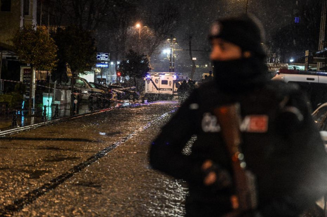 a turkish police officer stands guard along a street leading to where a female suicide bomber was killed on january 6 2015 when she blew herself up in an attack on the police station in the main tourist district of istanbul photo afp a turkish police officer stands guard along a street leading to where a female suicide bomber was killed on january 6 2015 when she blew herself up in an attack on the police station in the main tourist district of istanbul photo afp