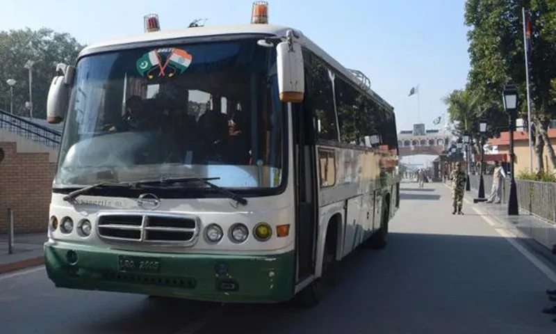 the bus runs between pakistan and india four times a week photo afp the bus runs between pakistan and india four times a week photo afp
