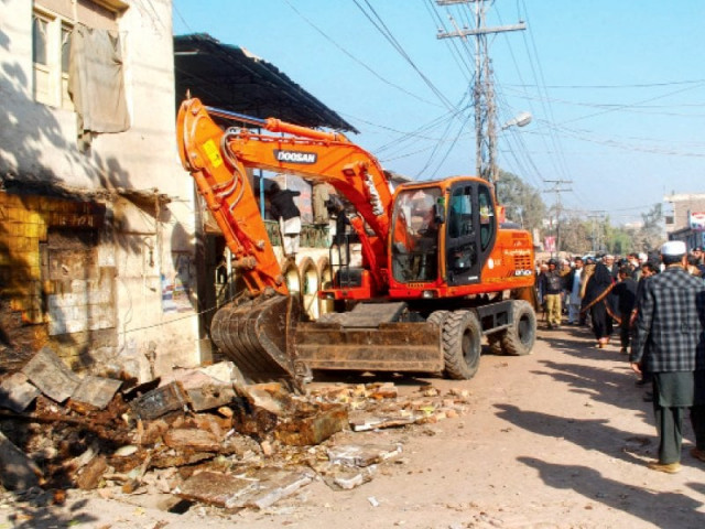 district administration bulldozes illegal set ups on ramdas road bhanamari photo muhammad iqbal express district administration bulldozes illegal set ups on ramdas road bhanamari photo muhammad iqbal express