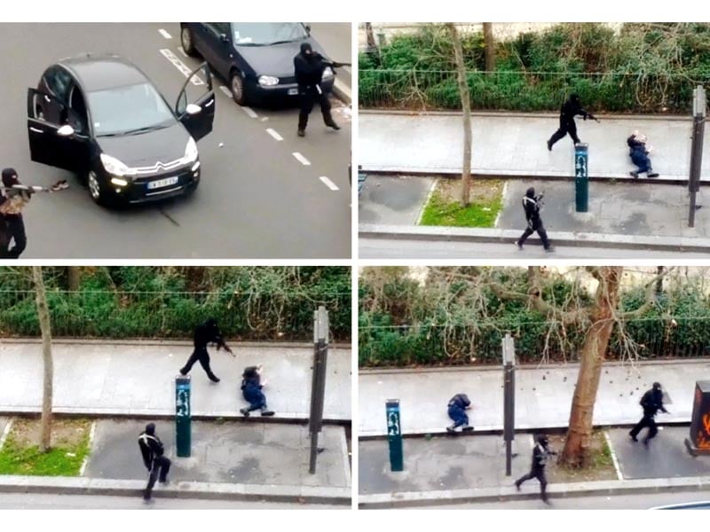 gunmen shoot a police officer outside the offices of charlie hebdo in paris photo reuters