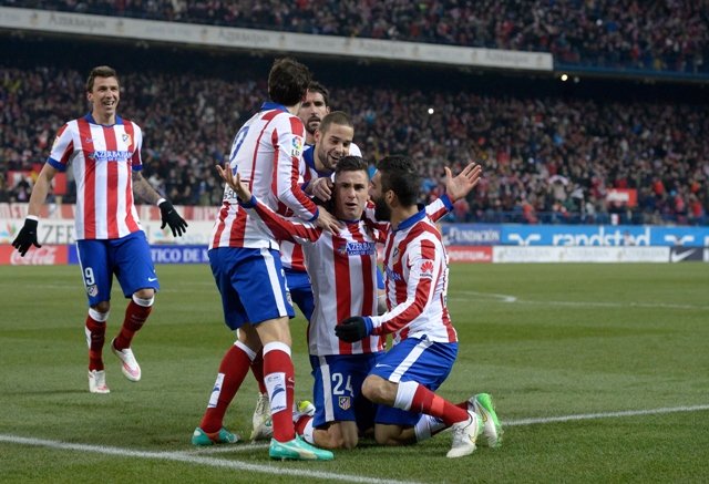 uruguayan defender jose gimenez 2ndr celebrates after scoring during the spanish copa del rey king 039 s cup round of 16 first leg football match club atletico de madrid vs real madrid cf at the vicente calderon stadium in madrid on january 7 2015 photo afp