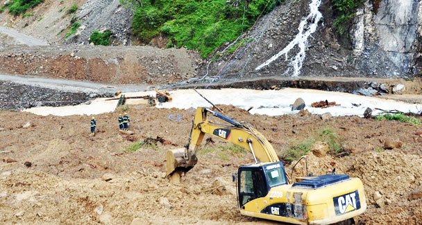 landslide believed to have occurred when debris heaped beside mine collapsed after it was loosened by heavy rains photo afp