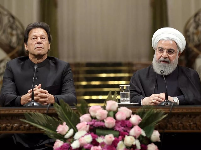 pakistan prime minister imran khan and iranian president hassan rouhani address a joint press conference photo afp